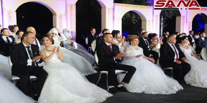 200 عريس وعروس بالعرس الجماعي العمالي الأول في مجمع صحارى