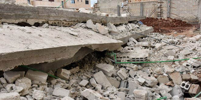 وفاة ثلاثة أشخاص من أسرة واحدة في انهيار مبنى سكني بمدينة حماة